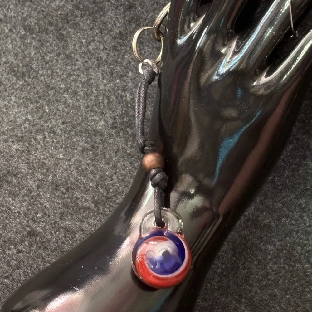 Red, White and Blue Marble Swirl Glass Pendant on Black Cord Keychain
